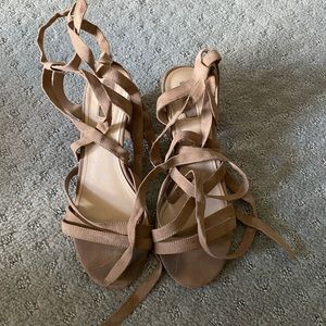 Tie up gladiator sandals with small heel